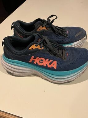 Hoka Women's Navy Running Shoes with Teal Midsole and Orange Accents